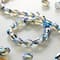 12 Pack: Blue Lustrous Teardrop Glass Beads, 6mm by Bead Landing™